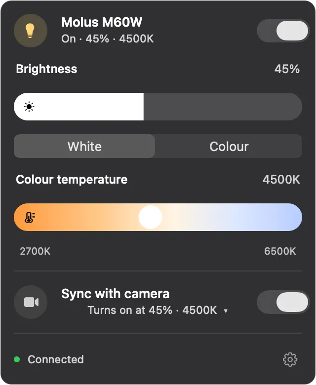 The Molus control panel in the menu bar, showing brightness and colour temperature